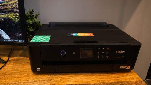 Photo of black Epson printer on a table